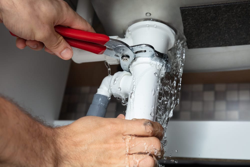 HVAC technician completing work at a home in New Jersey